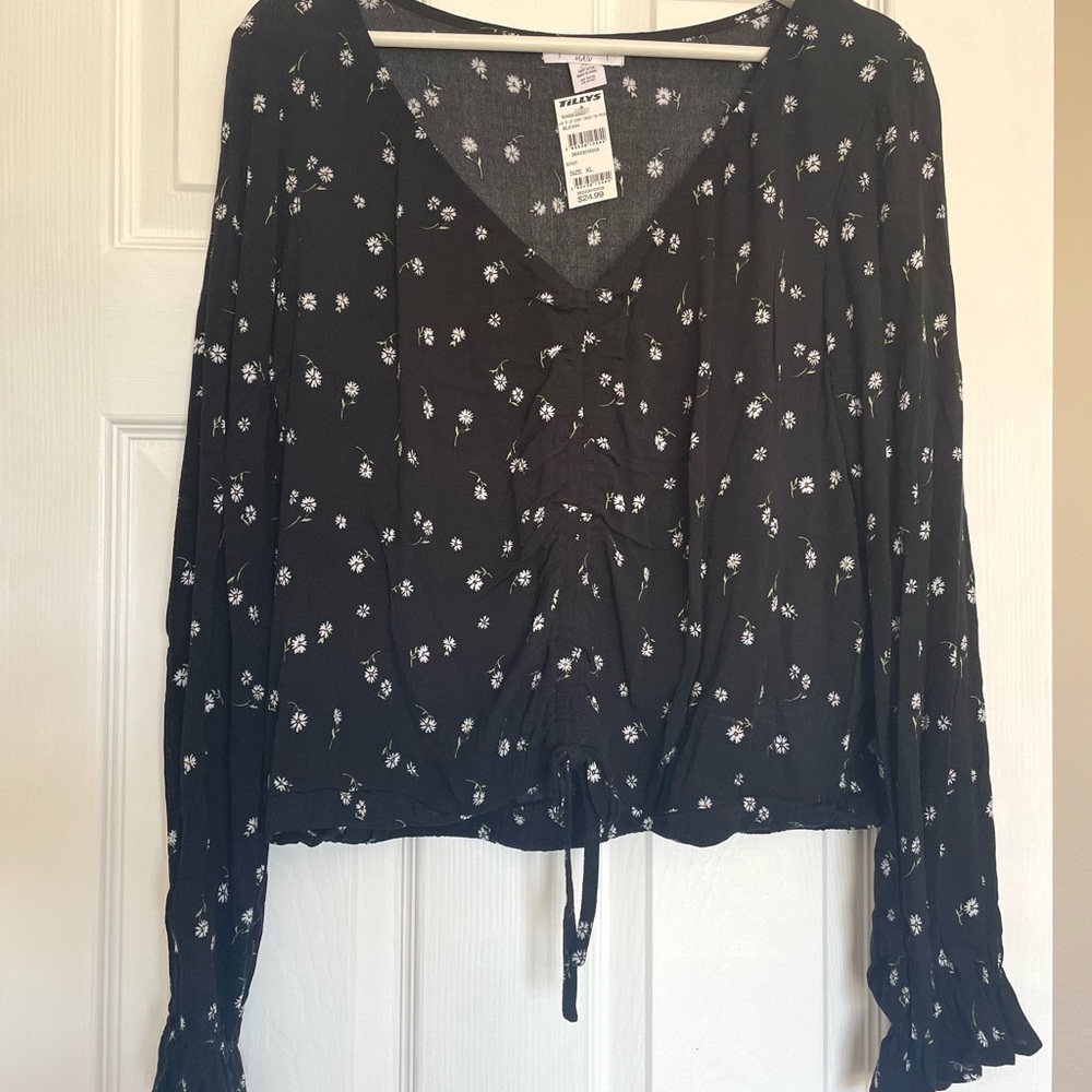 Long sleeve crop top with front tie on bottom
